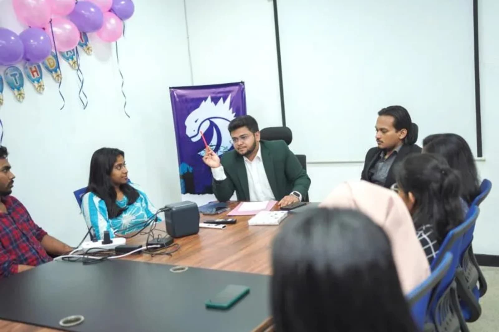 Codezela team collaborating during a strategy meeting