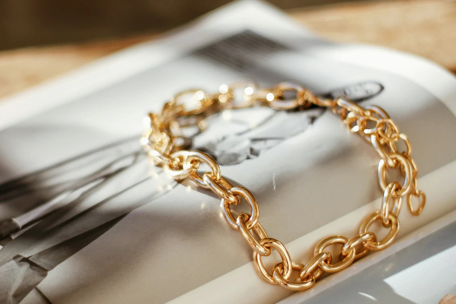 Gold jewellery arranged for an elegant product presentation